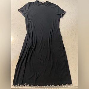 Simple black ribbed dress with white detail